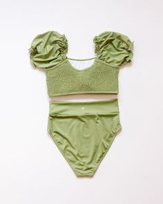 Get ready to make a splash with this fun and flirty Green Smocked Bikini 2pc Women Swimsuit. The smocked detailing adds a touch of playfulness while providing a comfortable and flattering fit. Perfect for lounging by the pool or hitting the beach, this swimsuit will have you feeling confident and stylish all summer long! soft & stretchy，UPF 50+ 87% nylon 13% spandex Trendy Smocked Top For Beach In Summer, Trendy Summer Smocked Top For Beach, Trendy Summer Beach Smocked Top, Trendy Summer Smocked Top For The Beach, Trendy Smocked Top For Beach, Summer Smocked Top With Smocked Bodice For Vacation, Stretch Smocked Top For Summer Vacation, Trendy Fitted Smocked Top For Beach, Stretch Smocked Top With Ruched Detail For Beach