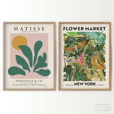 two framed posters with plants and flowers on them, one is green and the other is pink