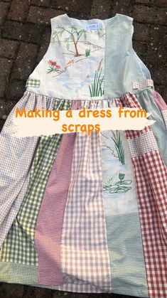 a dress made out of different fabrics on the ground with words making a dress from scraps