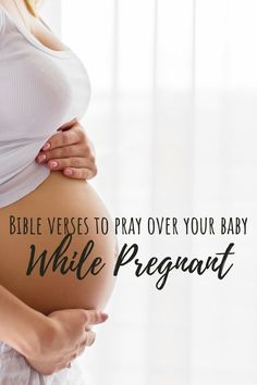 a pregnant woman holding her belly with the words bible verse to pray over your baby while pregnant