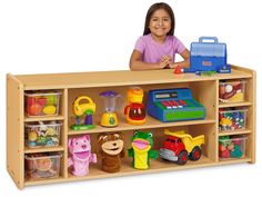 Featuring easy-access storage and heavy-duty construction that will last for years, our child-friendly unit provides ample space for all your classroom essentials! The durable, wipe-clean laminate unit has 2 extra-long shelves for oversize materials, 6 handy cubbies to organize smaller items with or without our Clear-View Bins (sold separately), plus rounded corners with protective edgebands. Unit measures 55 3/5"w x 15"d x 22 1/2"h. Low Bookshelves, Preschool Furniture, Cubby Shelf, Kids Shelves, Storage Cabinet Shelves, Classroom Furniture, Nursery Storage, Kids Classroom, Shelf Storage