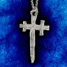 If you're looking for a new way to carry your faith, the Cross crosslet pendant is perfect. Solid 925 sterling silver heraldic medieval style cross with ends of two arms crossed. Available in polished silver or polished oxidised silver as a pendant only or on a selection of chain lengths. Cross measures 48mm X 27mm. Material : 925 Sterling Silver. Made to order in our Jewel Thief Brighton Atelier. Medieval Sterling Silver Pendant Jewelry, Gothic Sterling Silver Cross Necklace, Medieval Sterling Silver Necklace In Silver, Hand Forged Silver Cross Pendant Jewelry, Silver Hand Forged Cross Pendant Jewelry, Medieval Hand Forged Sterling Silver Jewelry, Spiritual Silver Cross Necklace With Oxidized Finish, Medieval Silver Cross Pendant Jewelry, Hand Forged Silver Medieval Jewelry