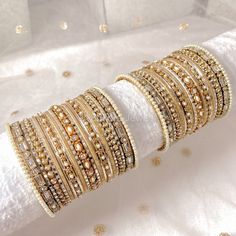 2 stacks of Mirror & sparkly golden bangles. Ready to ship as seen with small gift box. No roll. Sold as pair Gold Stackable Cuff Bracelet Gift, Gold Sparkling Bracelets For Anniversary, Gold Stackable Cuff Bracelet For Anniversary, Sparkling Gold Bracelets For Anniversary, Elegant Gold Sparkling Bangle, Traditional Rose Gold Bangle As Gift, Gold Sparkling Bracelets For Wedding, Sparkling Gold Bracelets For Wedding, Adjustable Gold Bangle For Festive Occasions