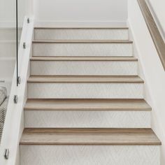 a set of stairs leading up to a bedroom