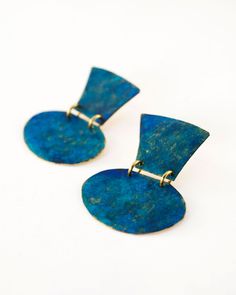 These statement dangle earrings are featuring hand cut brass frames and colorful patina. Geometric vase shaped brass frames are hand cut first and then hand painted with patina and colorful oxides to create old faded/distressed paint effect. Handmade and boho minimalist design, inspired by world travels and terracotta pots Unique and vibrant patina texture on brass featuring blue, turquoise and gold colors Earrings are sealed with few coats of clear glaze to ensure everlasting colors Very lightw Patina Texture, Earthy Blue, White Statement Earrings, Blue Statement Earrings, Dressy Earrings, Geometric Statement Earrings, Patina Earrings, Blue Minimalist, Geometric Vases