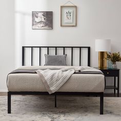 the bed is made up and ready for someone to use it in their home or office