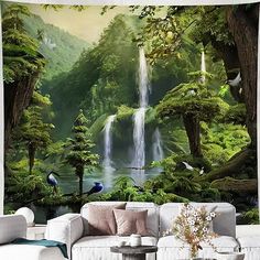 a living room filled with furniture and a waterfall