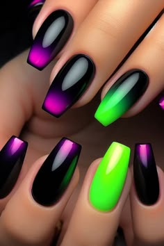 Embrace a vibrant Halloween look with these simple black nails adorned with neon green and purple accents. This striking design combines the classic elegance of black with bold neon pops for a fun and festive touch. Perfect for a quick, eye-catching manicure that celebrates the season in style! Black Nails With Purple Accent, Neon Green Glow In The Dark Nails, Black To Purple Nails, Colorful Black Nails, Black Purple Green Nails, Purple Green And Black Nails, Purple Green Black Nails, Halloween Nails Purple And Green, Green And Purple Nails Ideas