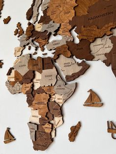 a world map made out of wooden pieces