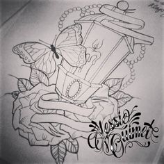 a black and white photo of a tattoo design with butterflies on the back of it