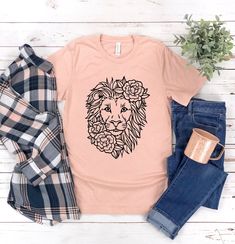 Floral Lion Shirt, Cute Shirts for Women, Lion Shirt, Lion Flower Shirt, Leo Shirt, Gift for Her, Animal Lover, Graphic Tees, Animal Shirts My shirts, sweatshirts, and tanks are a fun and joyous way to show your style while shopping, heading to the beach, and bringing your children to social events, family outings, and everyday life. All my t-shirt designs are direct to garment, Eco-friendly and provide the best quality and longevity.  Floral Lion Picture: Lion with Flowers Sizes: S - 2XL  Fabri Cute Shirts For Women, Lion Flower, Lion Shirt, Lion Pictures, Flower Shirt, Animal Shirts, Shirts For Women, Cute Shirts, Animal Lover