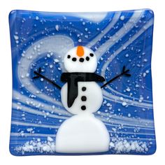 a glass plate with a snowman on it