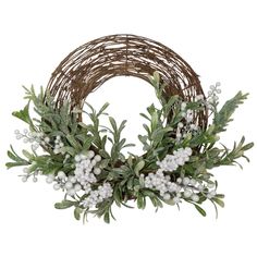 a wreath with white flowers and green leaves