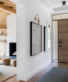 a living room filled with furniture and a fire place