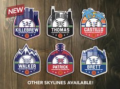 six different stickers with the names of cities and major league baseball teams on them