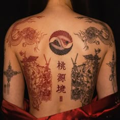 the back of a woman with tattoos on her body