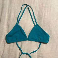 Jolyn Triangle Bikini Top In Teal Blue. Never Worn. Sustainably Made With Recycled Materials. Compression Fabric Designed For Water Activity - Perfect For Surf Or Swim. Blue Swimwear With Built-in Bra And Tie-side Bottom, Blue Stretch Halter Top For Swimming, Turquoise Halter Neck Swimwear For Poolside, Blue T-back Summer Swimwear, Blue Halter Top With Built-in Bra For Swimming, Blue Sleeveless Halter Top For Poolside, Blue Halter Top With Built-in Bra For Beach Season, Blue Bra-friendly Swimwear For Poolside, Blue T-back Halter Top For Poolside