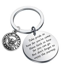 a keychain with a quote on it that says, take pride in come how far you can go but don't forget to enjoy the journey