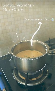 a pot on top of a stove with the words sunday morning in front of it