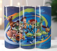 three tumblers with toy story characters on them