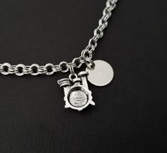 "Personalized Antique Silver Drum Set Bracelet! A dainty drum set charm on a lovely chain bracelet makes the perfect gift for you or your best friend. The drummer bracelet charm is made from zinc alloy and measures 16 mm by 14 mm. The music bracelet is high quality zinc alloy and measures 8.5\". The music bracelet can be personalized with a .5\" silver plated disc stamped with the initial of your choice. The charm and initial disc are connected to the bracelet with sturdy split rings that will n Music-themed Bracelet Jewelry Gift, Adjustable Metal Music-themed Jewelry, Silver Music-themed Bracelets For Gifts, Silver Music-themed Bracelet For Gift, Music-themed Silver Bracelet As A Gift, Silver Music-themed Bracelet As Gift, Chef Necklace, Lover Bracelet, Music Bracelet