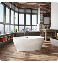 a large white bath tub sitting in a bathroom next to a window filled with lots of windows