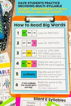 a clipboard with the words how to read big words on it next to some pens and pencils