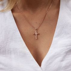 Elegant carved ferns and leaves deliver timeless charm to this Hawaiian Heirloom Cross Pendant. Complete with a natural diamond, this pendant is a symbol of love, honor, and respect. Cherish and pass down this keepsake for generations. Cross Pendant 14k Rose Gold Natural Diamond: 0.05 CTW Measures approx. : 30mm in Length x 15.85mm in Width Chain not included, Shop Chains Now Exclusively Made in Hawaiʻi Forever Guarantee (Lifetime Warranty on the life of the piece) Free Shipping on USA Orders $1 Engraved Rose Gold Cross Jewelry, Rose Gold Cross Jewelry With Diamond Cut, Personalized Rose Gold Cross Pendant Jewelry, Personalized Rose Gold Cross Jewelry, Medium Cut, Rose Gold Pendant, Scroll Design, Cross Designs, Old English