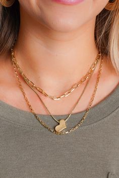 Spread the love with our Valentina Layered Necklace. This unique piece features a small square chain, a gold link chain with a heart pendant, and a paper clip chain, all in one necklace! With a length of 18 inches, it's the perfect statement piece for any outfit. It is lea and nickel compliant and is light weight Trendy Gold Heart Necklace For Everyday, Trendy Heart Shaped Necklace With Gold Chain, Trendy Heart-shaped Everyday Chain Necklace, Trendy Gold Layered Necklace With Paperclip Chain, Trendy Heart-shaped Gold Chain Necklace, Trendy Everyday Heart-shaped Chain Necklace, Everyday Heart Necklace With Chain For Valentine's Day, Valentine's Day Heart Necklace With Chain For Everyday, Trendy Chain Necklace With Heart Charm For Everyday