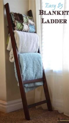 a ladder that has towels on it and the words easy $ 5 blanket ladder above it