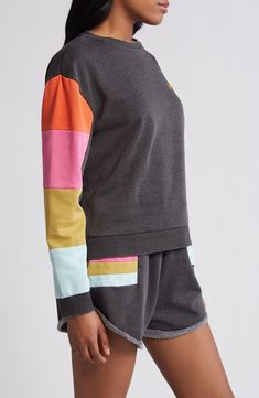 Colorful stripes race down the sides of this cozy crewneck sweatshirt that makes the perfect addition to your off-duty wardrobe. Crewneck Ribbed cuffs and hem Dropped shoulders 100% cotton Machine wash, line dry Imported Sporty Raglan Sleeve Sweatshirt For Loungewear, Sporty Striped Color Block Top, Casual Multicolor Tops With Striped Sleeves, Multicolor Fleece Sweatshirt With Long Sleeves, Multicolor Fleece Long Sleeve Sweatshirt, Color Block Sweatshirt For Loungewear, Color Block Relaxed Fit Sweatshirt For Loungewear, Relaxed Fit Color Block Sweatshirt For Loungewear, Multicolor Long Sleeve Fleece Sweatshirt