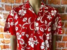 "Vintage RJC ltd. hawaiian men's red shirt floral print size large. Excellent condition, front pocket, 100% cotton. Made in Hawaii, Usa. Please, check carefully the measurements, photos and description of the article before buying it, we do not accept changes or returns. Measuraments lying face down from outside: 21\" Across chest underarm to underarm. 18 1/2\" Shoulder seam to seam.. 10\" Sleeve length from shoulder seam to cuff. 30\" Long, front middle top to bottom. Let me know if you have an Red Hawaiian Shirt With Tropical Print, Red Tropical Print Hawaiian Shirt, Red Printed Hawaiian Shirt For The Beach, Red Printed Hawaiian Shirt For Beach, Red Hawaiian Shirt With Camp Collar And Tropical Print, Red Hawaiian Shirt With Tropical Print And Camp Collar, Red Hawaiian Shirt With Camp Collar, Red Tropical Print Hawaiian Shirt With Camp Collar, Red Tropical Print Short Sleeve Hawaiian Shirt