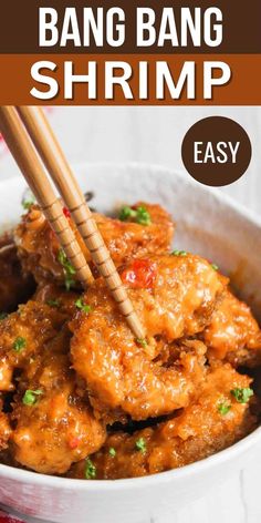 a bowl filled with meat and chopsticks next to the words bang bang shrimp