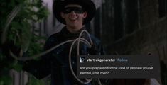 a man in a cowboy hat and blindfold holding a rope with the caption star trekmember follow