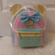 Nwt Price Is Firm Not Accepting Offers Any Offers Will Be Kindly Ignored Or Declined Disney Loungefly Pastel Sequined Minnie Mouse Mini Backpack Limited Edition/Sold Out Immediately Brand New Never Opened Still Sealed Up Selling As Is Unopened Approx Size 10 1/2" H X 9" W X 5" D 100% Authentic As Always No Price Police/No Rude Comments No Trades/No Holds All Items Are Always Triple Protected Before Mailing Out And Pictures Are Taken During Packing And Recorded Smoke Free Home Always Drama Free Z Cute Multicolor Backpack For Disney Trips, Cute Pink Backpack For Disney Trips, Pink Minnie Mouse Backpack For Disney Trips, Cute Multicolor Bags For Disney Trips, Playful Pink Bag For Disney Trips, Pink Minnie Mouse Standard Backpack, Minnie Mouse Multicolor Travel Bags, Minnie Mouse Multicolor Backpack, Cute Minnie Mouse Multicolor Bags