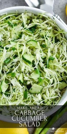 a white bowl filled with shredded cucumber salad