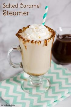 salted caramel steamer with whipped cream and chocolate syrup in the glass on top