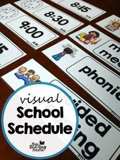 the visual school schedule is displayed on top of a wooden table with white and blue labels