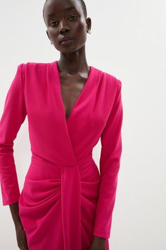 A dream for sophisticated dressers, this 1980s-inspired piece shows off bold, structured shoulders and a ruched pencil skirt. Defined by its wrap front and sharp V-neckline, it brings a polished power dressing vibe to the boardroom and the bar. Ruched Pencil Skirt, Crepe Dresses, Dresses V Neck, Dress Drape, Power Dressing, Dark Skin Makeup, Fashion Styling, Pink Midi Dress, Draped Dress