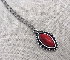 "Simple, chic and versatile! Here is a red stone necklace that is set in a perfectly detailed silver frame. The perfect everyday necklace! Made from allergy free plated silver. The pendant measures 1\" long by 1/2\" wide. It hangs from a shiny strong 18\" stainless steel necklace chain with a lobster clasp. I have matching earrings in my shop if you would like the whole set. Here is the link https://etsy.me/2R5NsWx I have this same style pendant necklace available in other color ways as well! He Red Southwestern Sterling Silver Necklace, Red Southwestern Style Jewelry Gift, Southwestern Style Red Jewelry For Gift, Southwestern Style Red Jewelry For Gifts, Red Southwestern Turquoise Necklace For Gift, Red Bohemian Sterling Silver Necklace, Southwestern Style Red Necklace For Gift, Nickel-free Southwestern Style Necklace As Gift, Southwestern Style Nickel-free Necklace For Gift