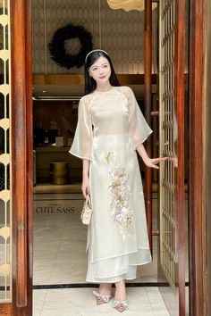 ❣️ This set includes one Ao Dai Top, 1 Pants Style: Modern  Material: Silk, Organza Chiffon. Non Stretch ❣️ This beautiful and modern ao dai set is perfect for any special occasions: Lunar NewYear, Mid Autumn Festival, Attending Wedding, or a Family photoshoot. ❣️ Please note: - Sizing may run smaller than American standard sizes, please refer to the sizing charts for sizing. - Please contact us if you have any questions ❣️We are proud to provide you with the highest quality fabric, handpicked m Elegant Embroidered Ao Dai For Summer, Chiffon Wedding Sets For Summer, Summer Chiffon Wedding Sets, Elegant Floral Embroidered Ao Dai For Summer, Long Embroidered Sets For Spring, Summer Organza Set With Embroidery, Elegant Short Sleeve Sets With Floral Embroidery, Festive White Embroidered Ao Dai, Festive Embroidered White Ao Dai