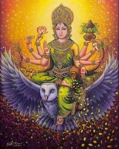 the goddess sitting on top of an owl with her eyes closed and hands out, surrounded by