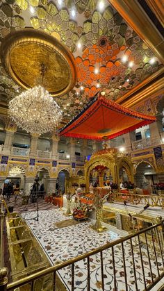 an elaborately decorated room with chandeliers and decorations