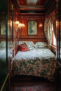 a bed sitting inside of a bedroom next to a window