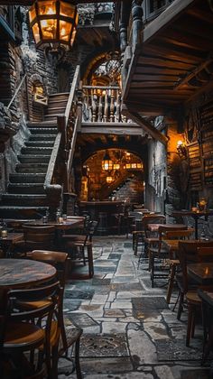 the inside of a restaurant with tables and chairs, stairs leading up to an entrance