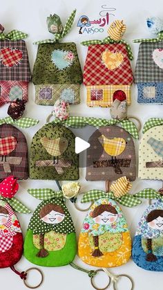 a bunch of small purses that are sitting on a table