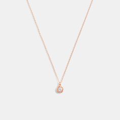 A sophisticated pick for day or night this delicate chain necklace features a polished Tea Rose bezel with a sparkling crystal center. It’s finished with an adjustable clasp closure to wear long or short. | Coach Halo Tea Rose Pendant Necklace - Women's - Rose Gold Feminine Rose Gold Necklace With Adjustable Chain, Party Necklace With Delicate Chain And Teardrop Pendant, Coach Necklace With Adjustable Chain As Gift, Coach Necklace With Adjustable Chain For Gift, Elegant Rose Gold Charm Necklaces For Formal Occasions, Elegant Rose Gold Drop Necklace With Delicate Chain, Rose Gold Necklace With Delicate Teardrop Pendant, Delicate Rose Gold Solitaire Necklace With Clavicle Chain, Delicate Rose Gold Pendant Chain Necklace