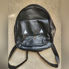 New, Never Used Black Cat Mini Backpack. Adjustable Straps, Main Compartment, And One Front Pocket With Magnet Closure. Will Fit Adult Or Child. #Minibackpack #Backpack #Cat #Black Cat Black, Mini Backpack, Front Pocket, Black Cat, Adjustable Straps, Bag Lady, Backpacks, Women Shopping, Black