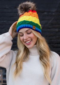 Classic Rainbow Stripe Cable Knit Fleece Lined Hat w/ Pom This rainbow stripe cable knit fleece lined hat will add a pop of color to your outfit. The fleece lining will keep you cozy and warm! Cold weather, Michigan winter approved! Hat features a faux fur pom accent. Make it a matching set! Coordinates with Rainbow Cabled Fleece Lined Mittens Material: Outer: 100% Acrylic Lining: 100% Polyester Cable Knit Hat, Faux Fur Pom Pom, Pom Pom Hat, Winter Colors, Fur Pom Pom, New Classic, Knit Hat, Winter Accessories, Rainbow Stripes