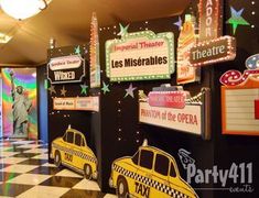 taxi cabs and neon signs are on display at the las miserableriables exhibit